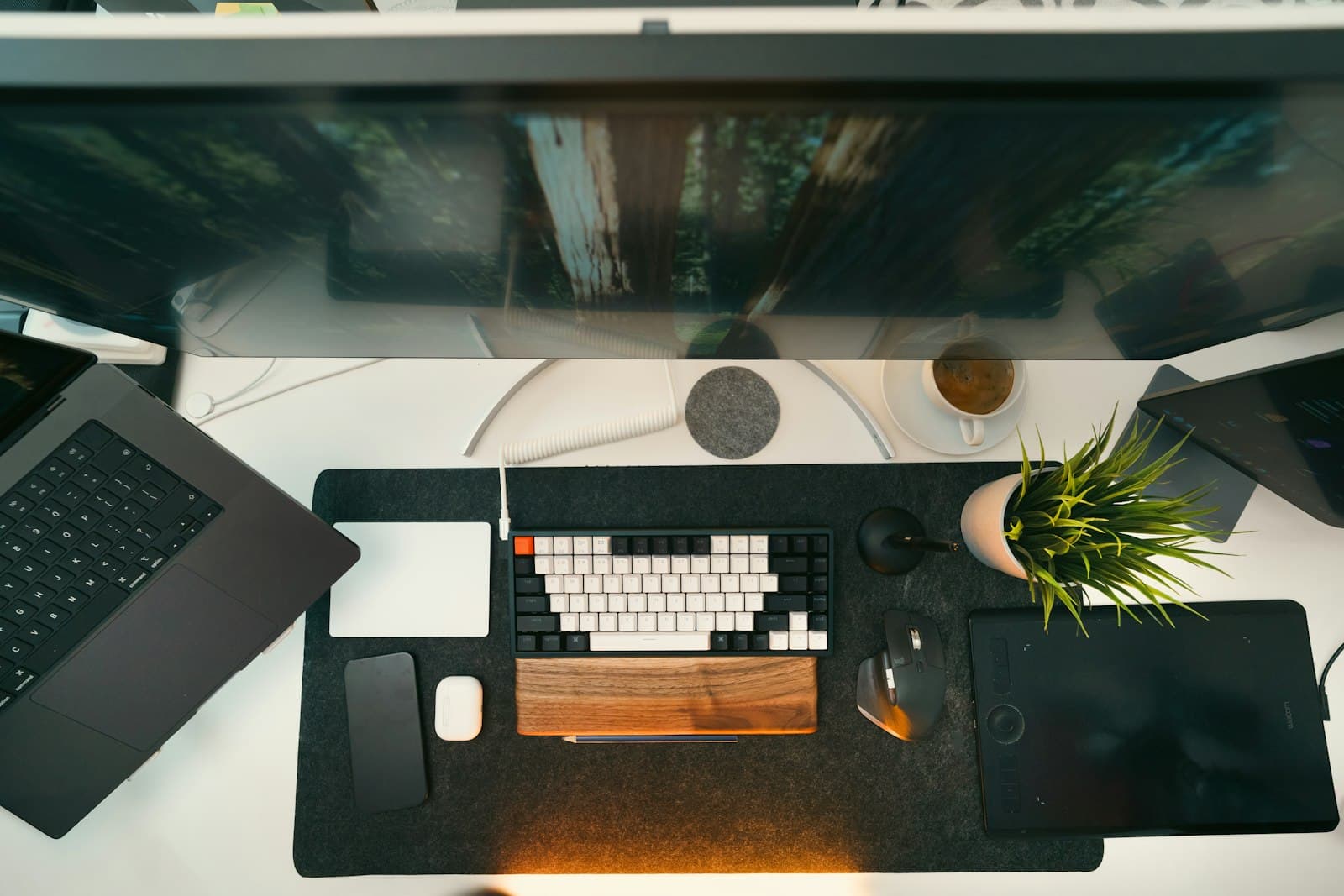 A clean, modern workspace with the tools of the trade